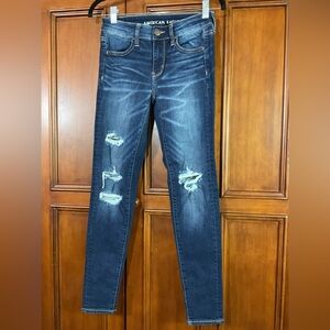 American Eagle Women’s Distressed W Holes Size 4 Darker Wash Denim Next Level St